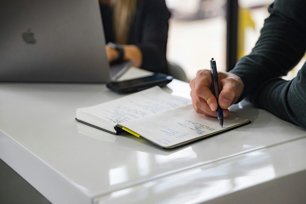 Lawyer reviewing case files and notes to identify their strongest area of practice