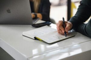 Lawyer reviewing case files and notes to identify their strongest area of practice